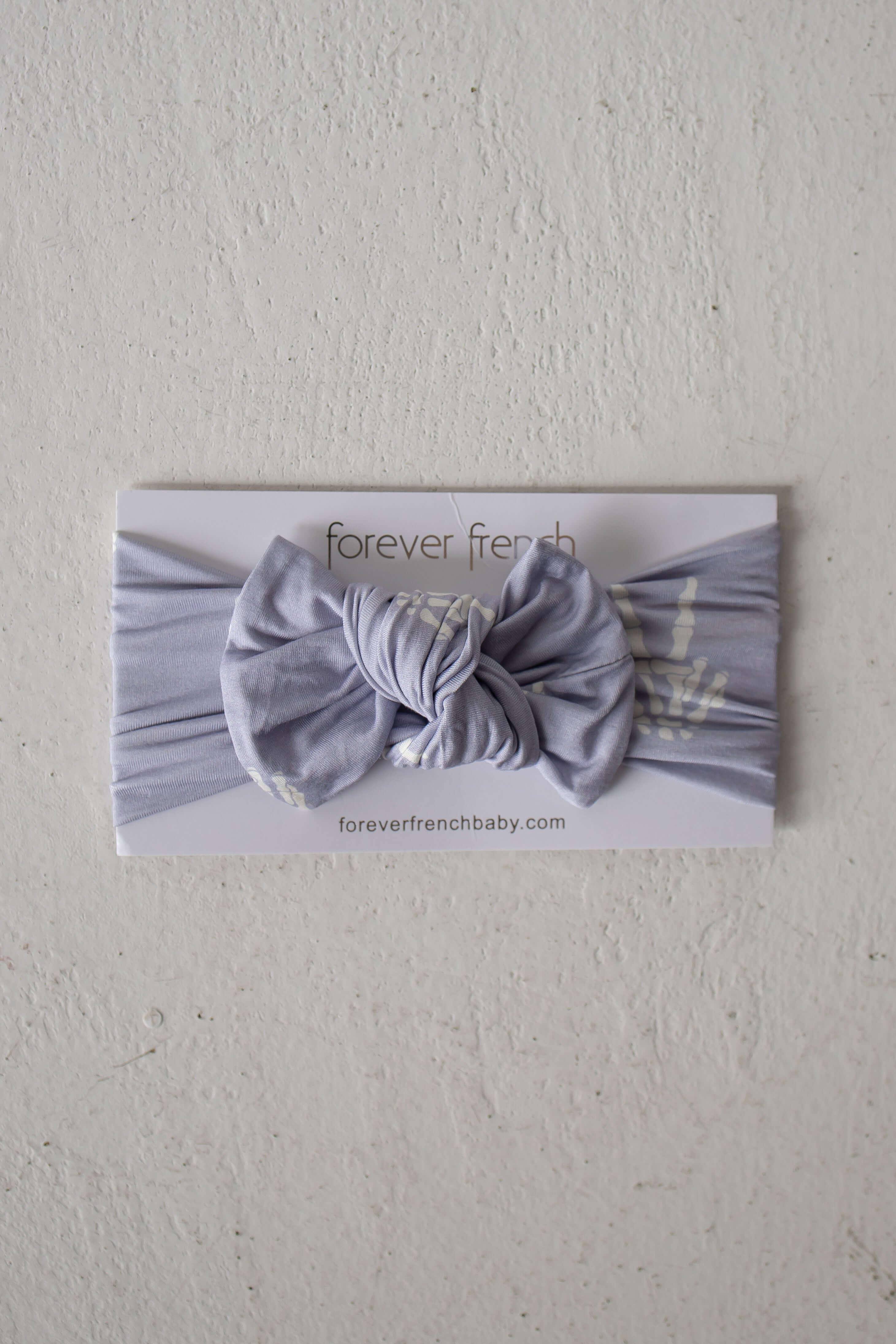 Enchanted Skelly | Bamboo Head Wrap | Discover the Bamboo Head Wrap with a stylish bow, perfect for babies and toddlers! Made from silky-soft bamboo material. | Milk & Baby