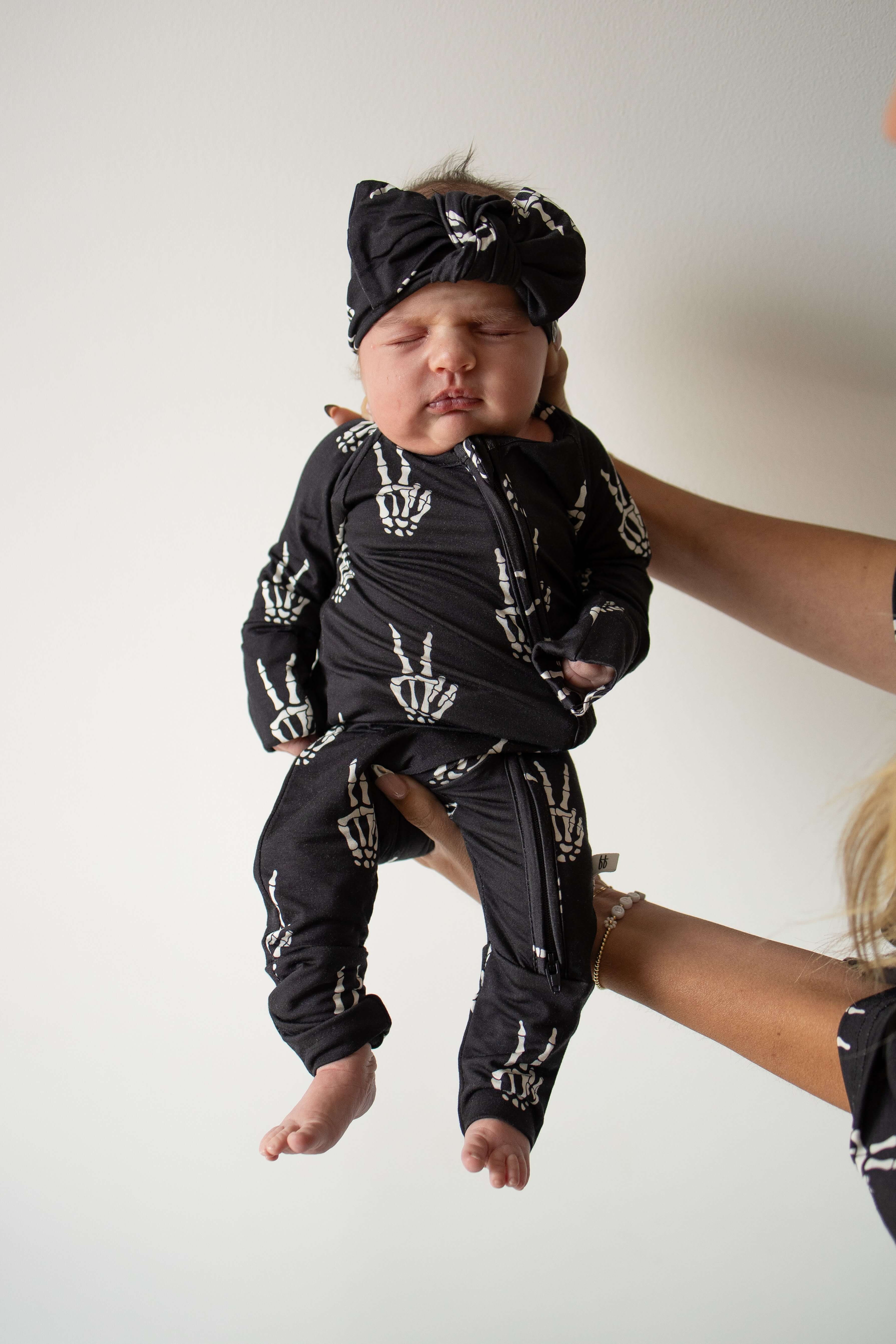 Midnight Skelly | Bamboo Zip Pajamas | Snuggle up in our Bamboo Zip Pajamas, crafted from premium bamboo for ultimate comfort. Perfect for cozy sleep and playful adventures! | Milk & Baby