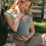 Acadian | Aerial Newborn Buckle Wrap | Meet the Aerial Newborn Buckle Wrap: the perfect blend of wrap-like coziness and buckle carrier convenience for your newborn babe. Crafted from our signature CloudBlend™ fabric, it's irresistibly soft and features a