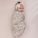 Sunny Petals Muslin Swaddle Blanket | Wrap your little one in the softness of our Sunny Petals Muslin Swaddle Blanket. Made from 100% Cotton, these blankets are as soft as butter and get even softer with each wash. Designed with both parents and babies in