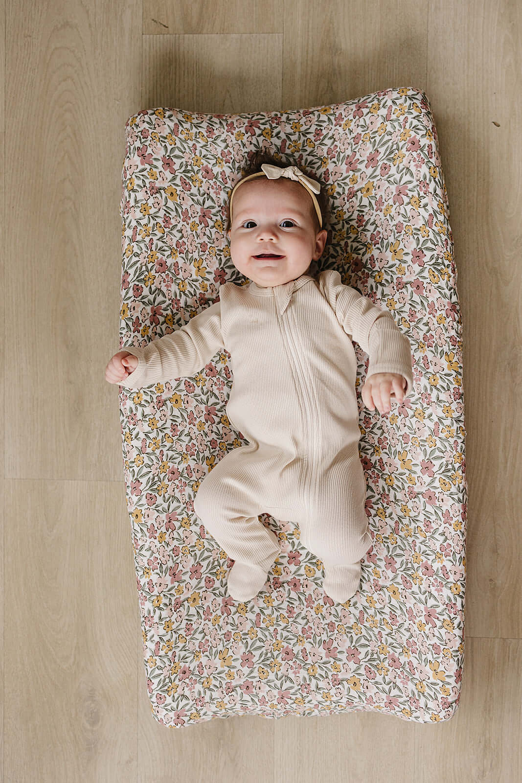 Sunny Petals Muslin Changing Pad Cover | Transform your baby's changing area with the Mebie Baby Sunny Petals Muslin Changing Pad Cover. Made from soft and breathable muslin fabric, this cover is gentle on your baby's skin. The fun design adds a touch of
