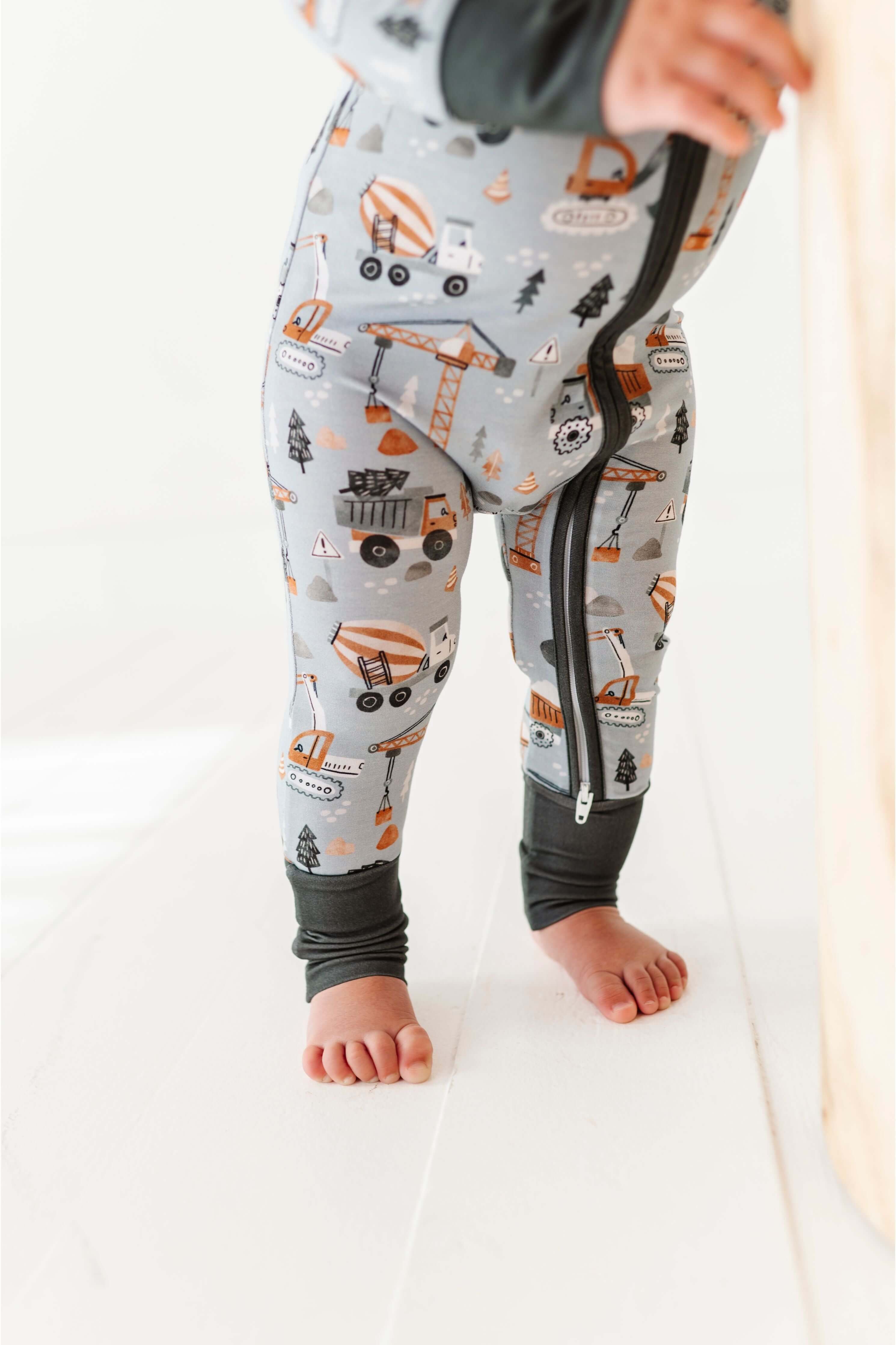 Mason | Bamboo One Piece Zip Pajama | . Mason Bamboo Convertible Romper Build a foundation for cozy comfort with our Mason Bamboo Convertible Romper! Made from luxuriously soft bamboo fabric, this romper is perfect for your little builder's downtime. The