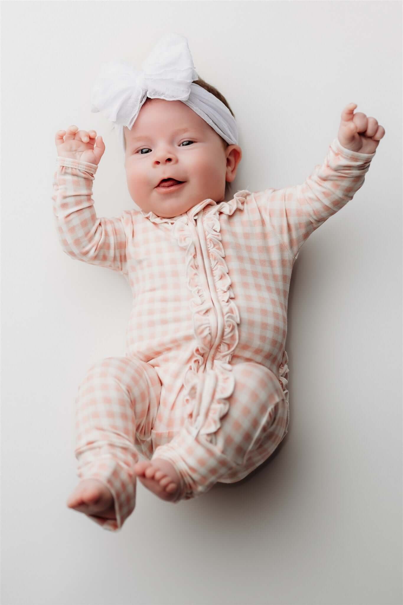 Olivia Ruffle Zip Footie | Milk & Baby