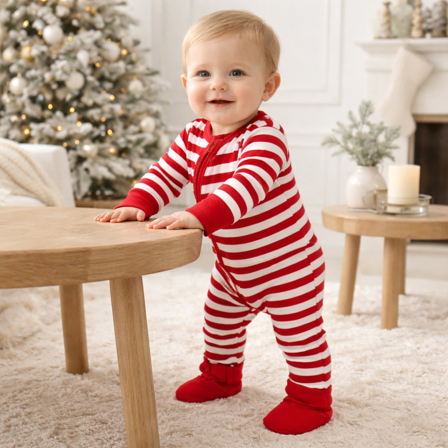 Candy Cane Christmas Stripe Baby Zipper Romper - 100% Cotton | Bring on the cheer with this ultra-soft baby romper in candy cane red stripes! Crafted from 100% cotton with rich yarn-dyed stripes and vibrant red trim, it's the perfect blend of festive and