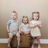 Yellow Floral Button Bubble Romper | Milk & Baby