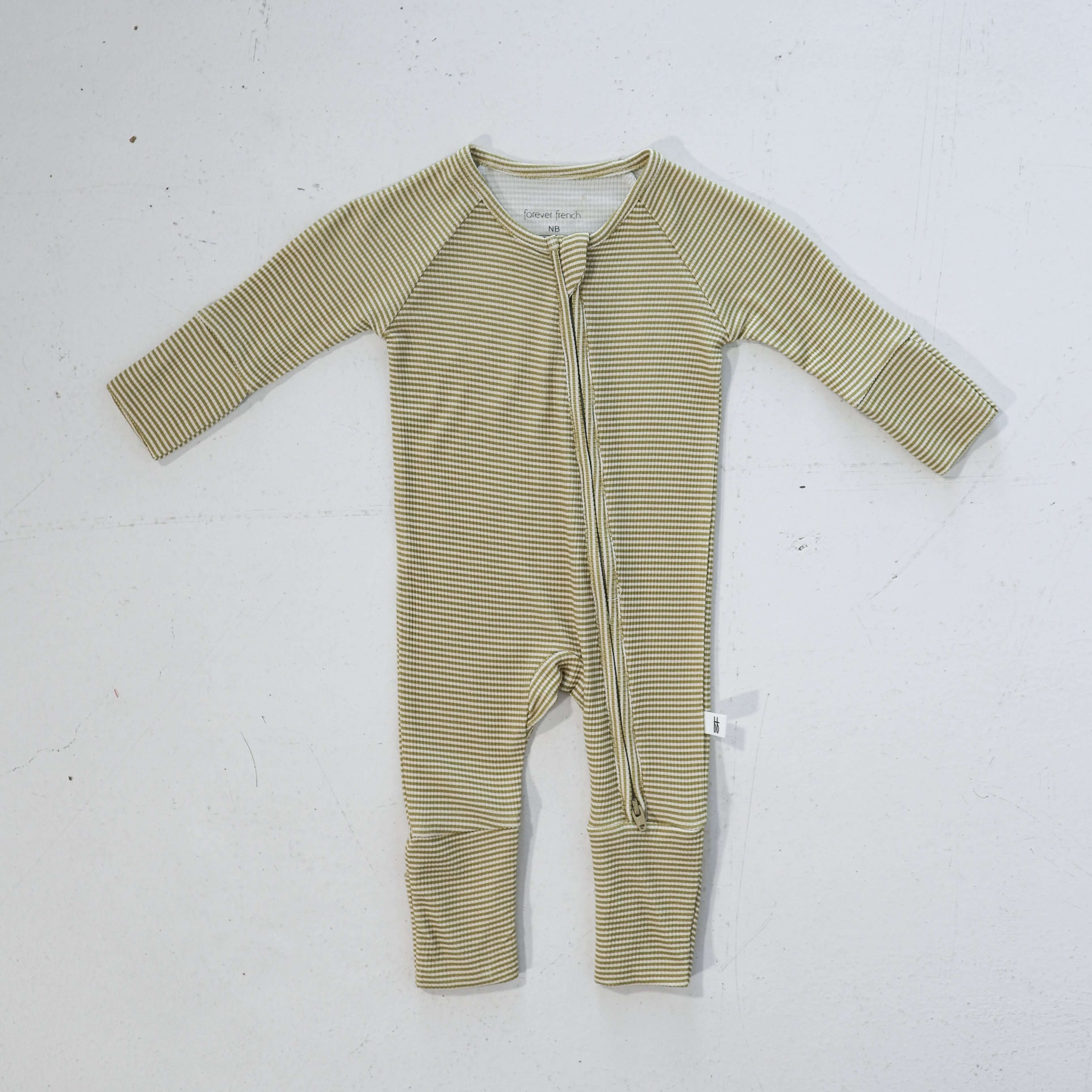 Willow Stripe Ribbed | Bamboo Zip Pajamas | Made of the softest premium bamboo. Durable and well designed your little ones can sleep and play in these cozy pajamas. All sizes have rollover cuffs on the hands and all of the one piece sizes have cuffs on th