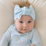 Blue Bows | Long Sleeve Bamboo Snapsuit | Made from the softest premium bamboo in our classic solid black, this snapsuit is cozy, durable, and easy to wear all day long. Designed for sleeping, playing, and everything in between, it features snap closures