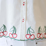 Cherry Cute Button Down showcasing embroidered cherry details and button placket for a charming design.