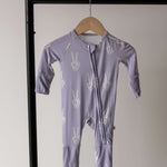 Enchanted Skelly | Bamboo Zip Pajamas | Discover Bamboo Zip Pajamas, soft and cozy for play and sleep. Rollover cuffs for flexibility, perfect for little ones! | Milk & Baby