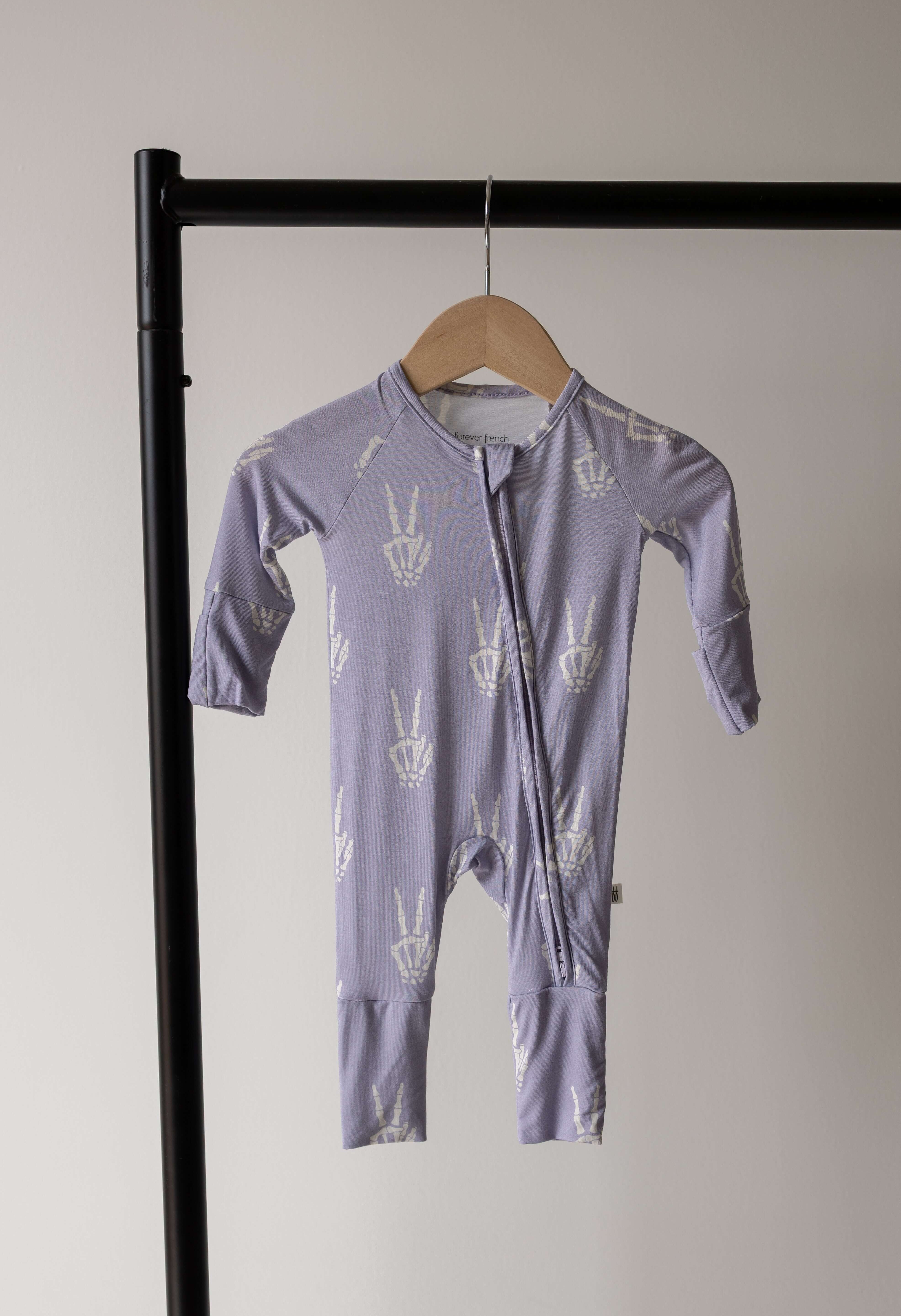Enchanted Skelly | Bamboo Zip Pajamas | Discover Bamboo Zip Pajamas, soft and cozy for play and sleep. Rollover cuffs for flexibility, perfect for little ones! | Milk & Baby