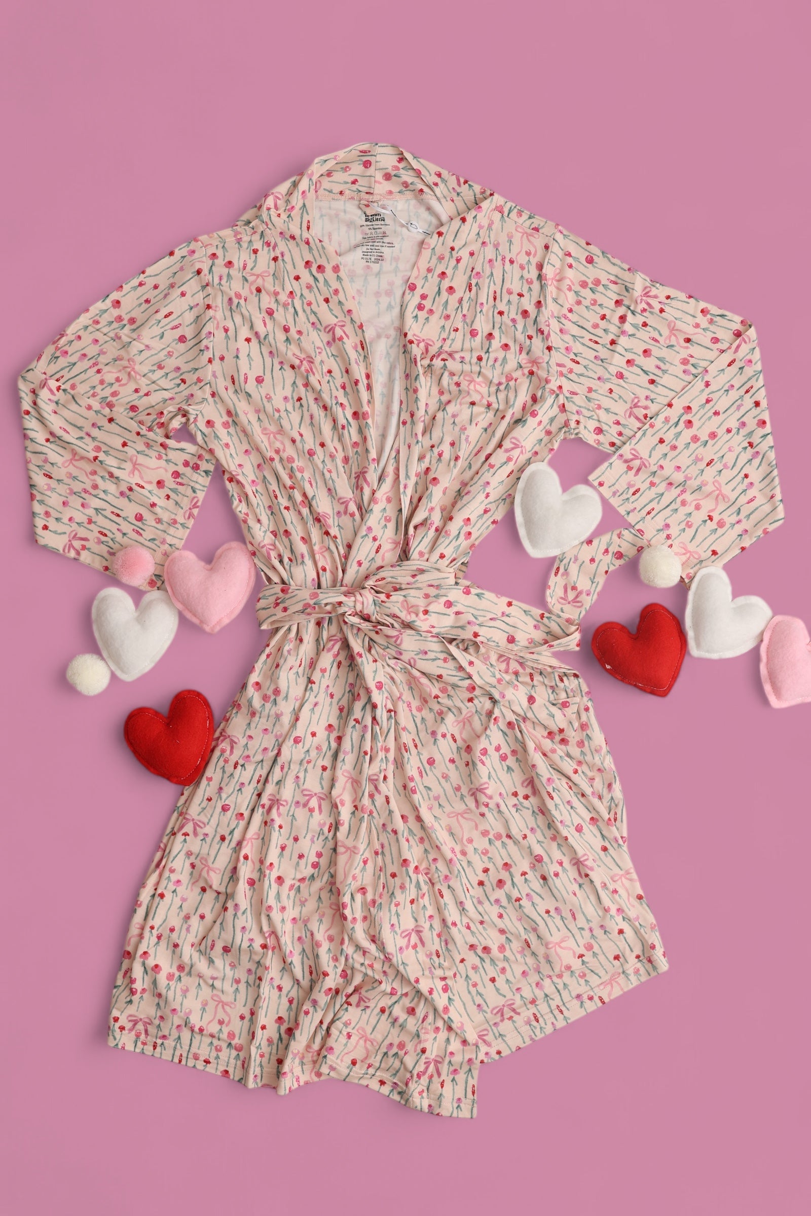 Blooms & Bows Women's Dream Robe with floral pattern and hearts on a pink background for a romantic look.