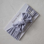 Enchanted Skelly | Bamboo Head Wrap | Discover the Bamboo Head Wrap with a stylish bow, perfect for babies and toddlers! Made from silky-soft bamboo material. | Milk & Baby