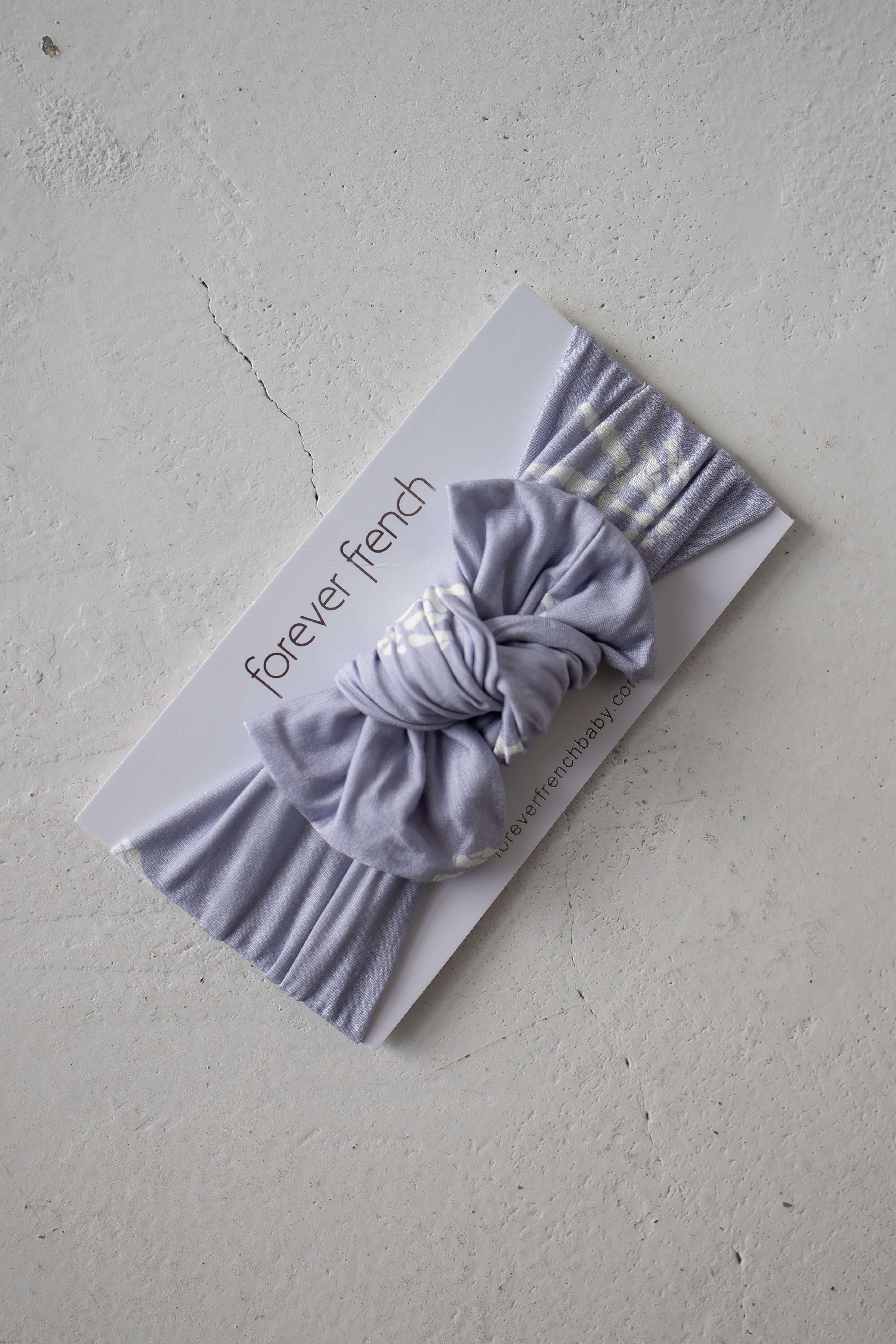 Enchanted Skelly | Bamboo Head Wrap | Discover the Bamboo Head Wrap with a stylish bow, perfect for babies and toddlers! Made from silky-soft bamboo material. | Milk & Baby