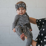 Black Gingham | Bamboo Head Wrap | Made from silky-soft bamboo material, this adjustable head wrap features a sweet bow for added style. Perfect for babies and toddlers!One size fits most Print: Black Gingham Material: 95% bamboo viscose / 5% spandex Care