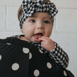 Black Gingham | Bamboo Head Wrap | Made from silky-soft bamboo material, this adjustable head wrap features a sweet bow for added style. Perfect for babies and toddlers!One size fits most Print: Black Gingham Material: 95% bamboo viscose / 5% spandex Care