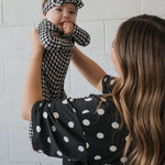 Black Gingham | Bamboo Head Wrap | Made from silky-soft bamboo material, this adjustable head wrap features a sweet bow for added style. Perfect for babies and toddlers!One size fits most Print: Black Gingham Material: 95% bamboo viscose / 5% spandex Care