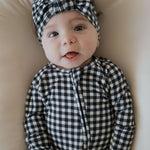 Black Gingham | Bamboo Head Wrap | Made from silky-soft bamboo material, this adjustable head wrap features a sweet bow for added style. Perfect for babies and toddlers!One size fits most Print: Black Gingham Material: 95% bamboo viscose / 5% spandex Care