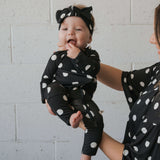 B&W Polka Dot | Bamboo Zip Pajamas | Made of the softest premium bamboo. Durable and well designed your little ones can sleep and play in these cozy pajamas. Our smallest sizes have rollover cuffs on the hands and all of the one piece sizes have cuffs on