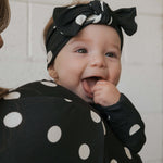 B&W Polka Dot | Bamboo Zip Pajamas | Made of the softest premium bamboo. Durable and well designed your little ones can sleep and play in these cozy pajamas. Our smallest sizes have rollover cuffs on the hands and all of the one piece sizes have cuffs on