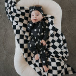 B&W Polka Dot | Bamboo Zip Pajamas | Made of the softest premium bamboo. Durable and well designed your little ones can sleep and play in these cozy pajamas. Our smallest sizes have rollover cuffs on the hands and all of the one piece sizes have cuffs on
