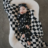 B&W Polka Dot | Bamboo Zip Pajamas | Made of the softest premium bamboo. Durable and well designed your little ones can sleep and play in these cozy pajamas. Our smallest sizes have rollover cuffs on the hands and all of the one piece sizes have cuffs on