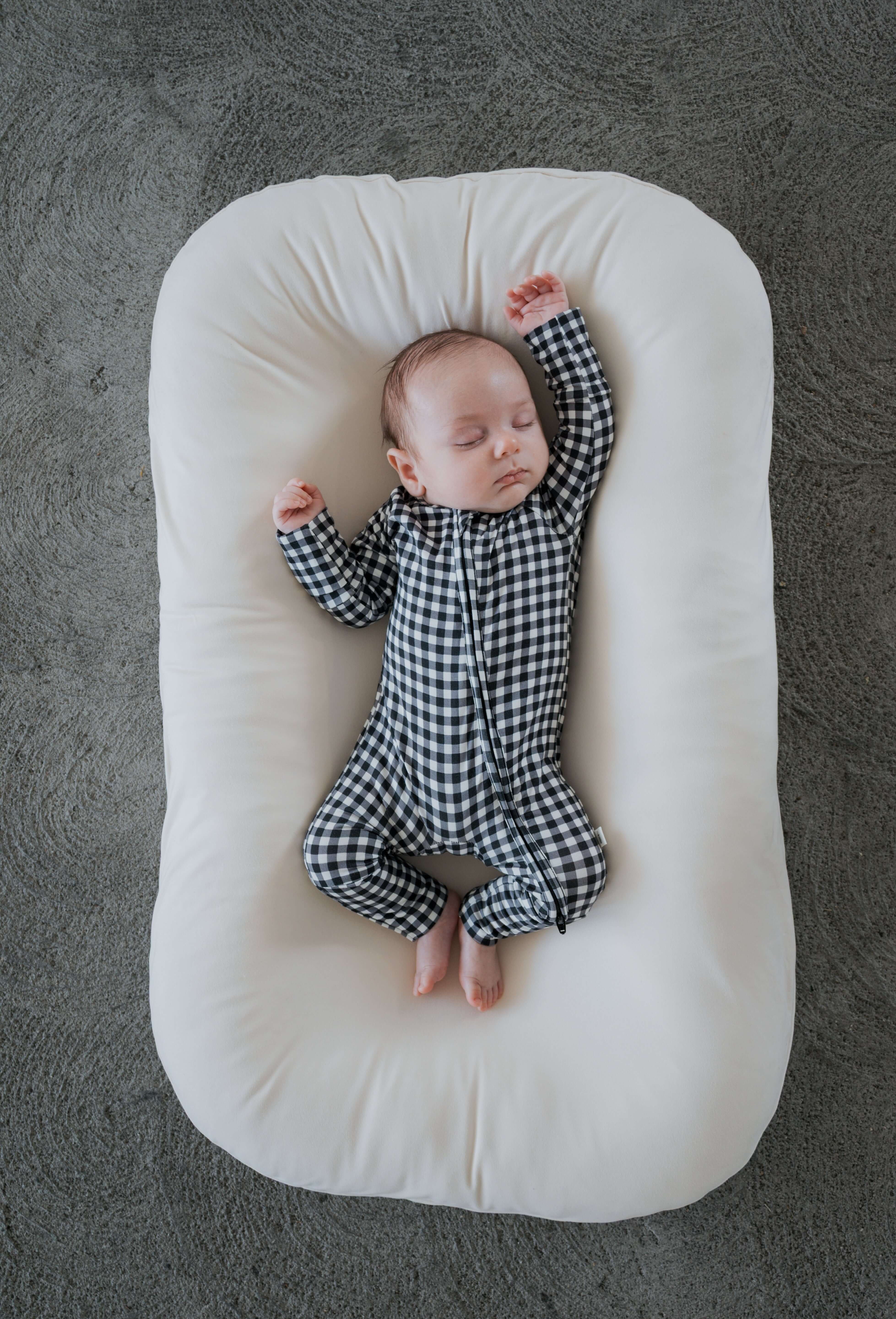 Black Gingham | Bamboo Zip Pajamas | Made of the softest premium bamboo. Durable and well designed your little ones can sleep and play in these cozy pajamas. Our smallest sizes have rollover cuffs on the hands and all of the one piece sizes have cuffs on