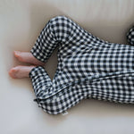 Black Gingham | Bamboo Zip Pajamas | Made of the softest premium bamboo. Durable and well designed your little ones can sleep and play in these cozy pajamas. Our smallest sizes have rollover cuffs on the hands and all of the one piece sizes have cuffs on