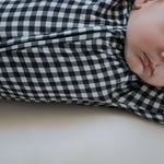 Black Gingham | Bamboo Zip Pajamas | Made of the softest premium bamboo. Durable and well designed your little ones can sleep and play in these cozy pajamas. Our smallest sizes have rollover cuffs on the hands and all of the one piece sizes have cuffs on