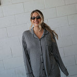 Black Gingham | Women's Bamboo Button Up Lounge Set | Say hello to your NEW favorite set. Our women’s bamboo lounge set just got an upgrade — now featuring a long-sleeve button-up top, designed with an effortless drop hem. Paired with our signature wide l