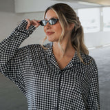 Black Gingham | Women's Bamboo Button Up Lounge Set | Say hello to your NEW favorite set. Our women’s bamboo lounge set just got an upgrade — now featuring a long-sleeve button-up top, designed with an effortless drop hem. Paired with our signature wide l
