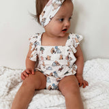 Pooh | Cross-Back Ruffle Romper | Milk & Baby
