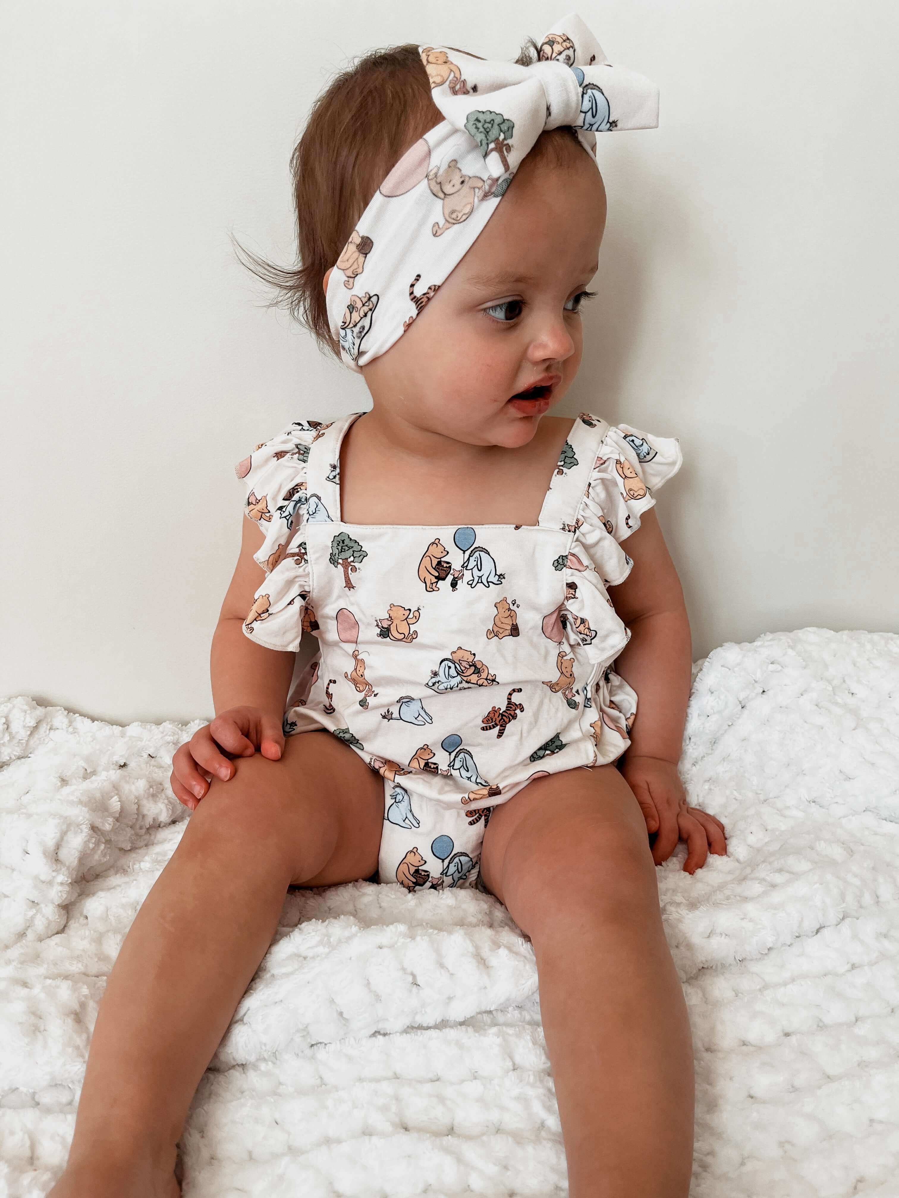 Pooh | Cross-Back Ruffle Romper | Milk & Baby
