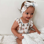 Pooh | Cross-Back Ruffle Romper | Milk & Baby