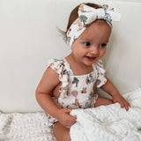 Pooh | Cross-Back Ruffle Romper | Milk & Baby