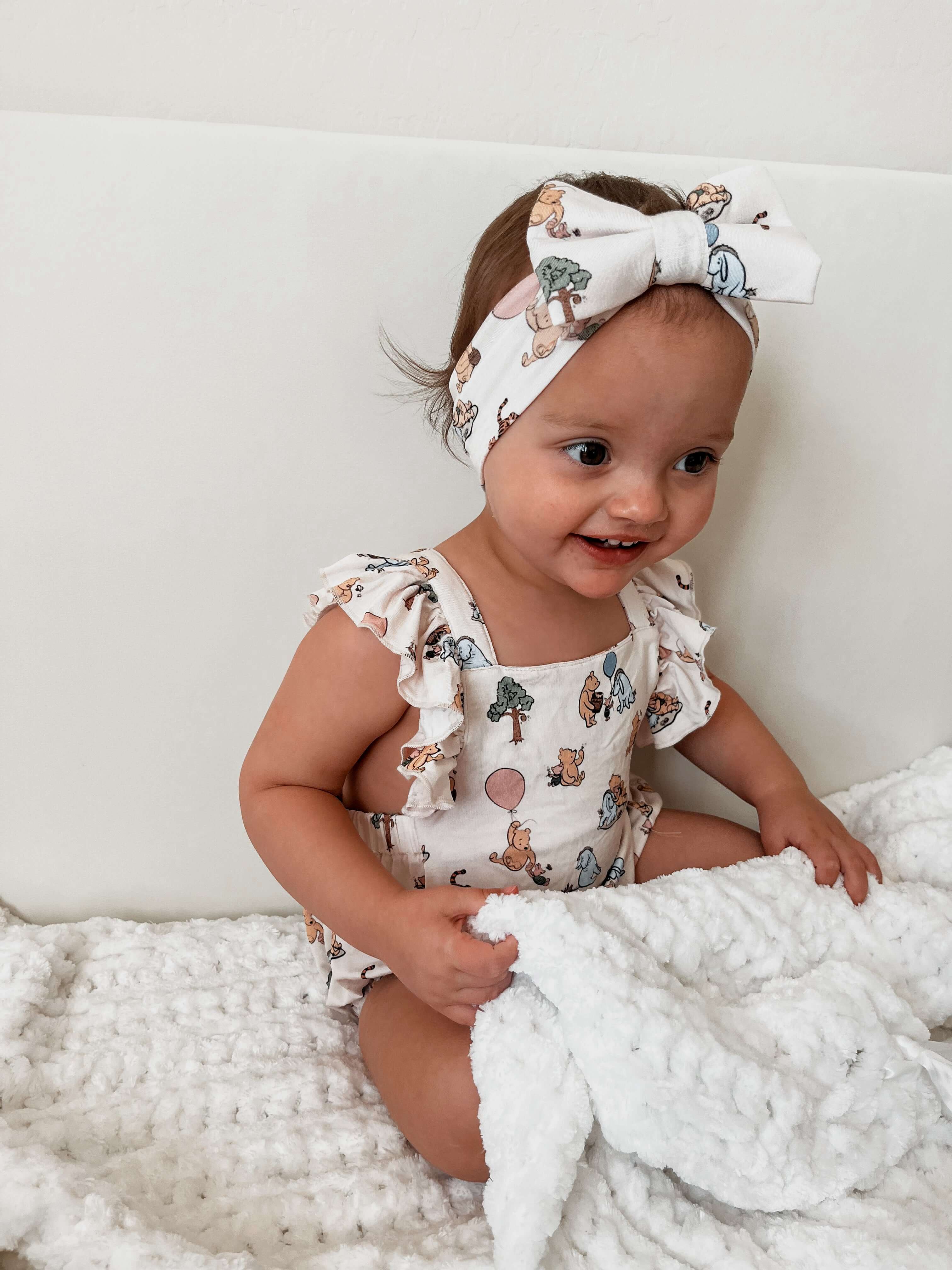 Pooh | Cross-Back Ruffle Romper | Milk & Baby