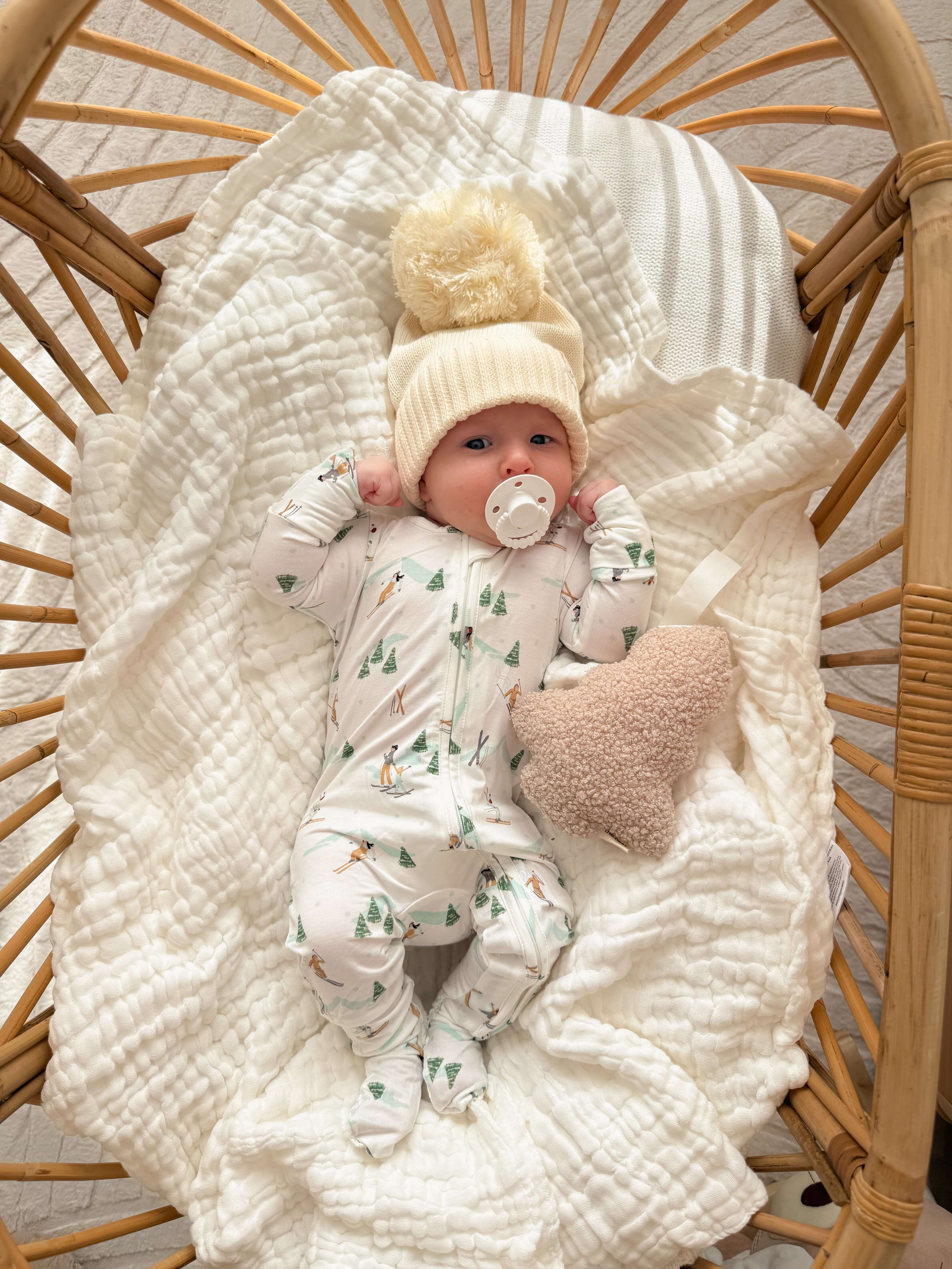 Hit the Slopes Bamboo Jumpsuit | Get cozy in our Bamboo Zip Pajamas! Perfect for skiing or napping, this jumpsuit features a fun snowy print and soft fabric for winter comfort. | Milk & Baby