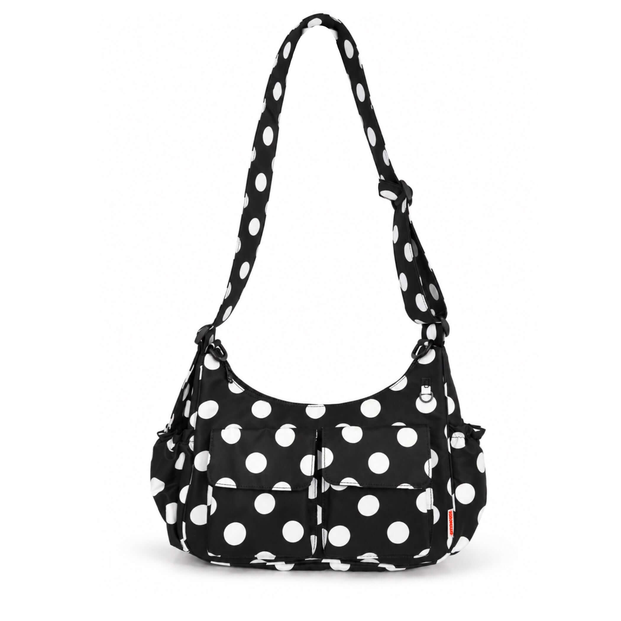 Cargo Crossbody Diaper Bag | The roomiest citymouse crossbody: 11 liters, two cargo pockets and room for four drinks, in a lightweight bag that looks like an everyday purse. | Milk & Baby