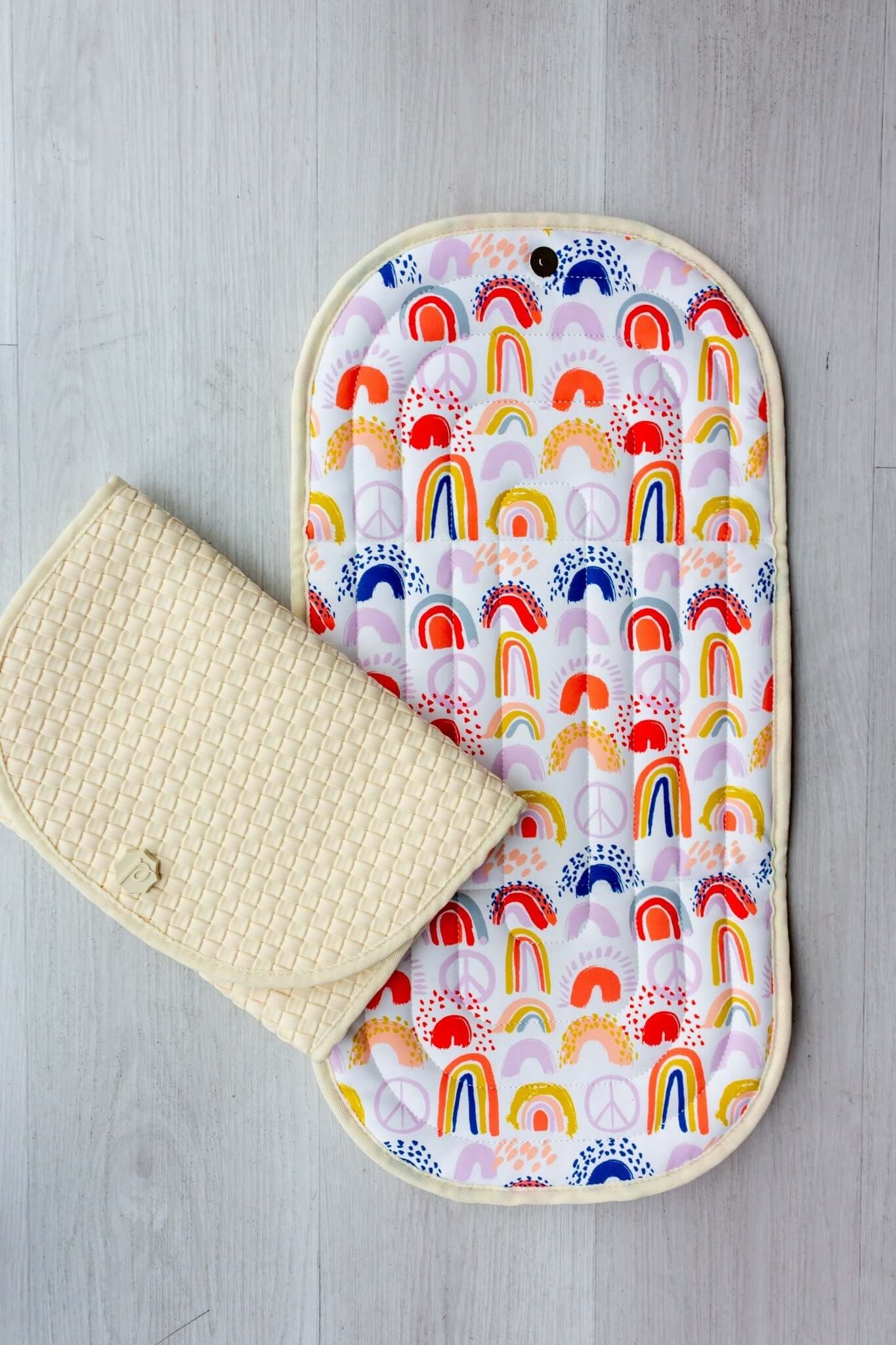 Rainbows Pink | Pret® Changing Clutch | Milk & Baby