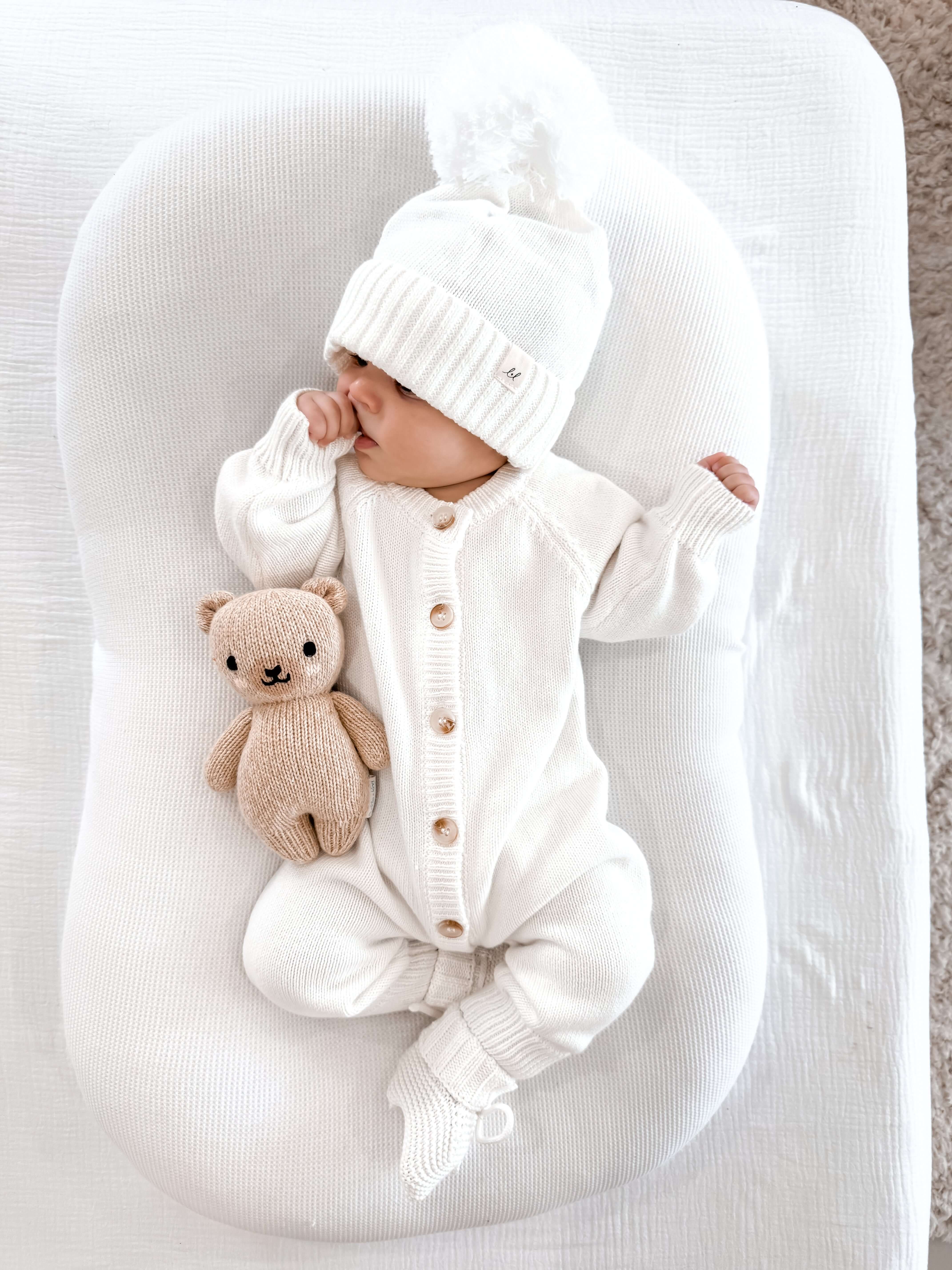 Essential Knit Jumpsuit | White | Discover our Baby Knits Essential Knit Jumpsuit, crafted from soft organic cotton for all-day comfort and timeless style. Perfect for snuggles and naps! | Milk & Baby