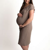 Pregnant woman wearing a Ribbed Cocoa Brown Labor & Delivery Gown, showcasing comfort and style for hospital use.