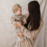Mom and baby in matching Striped Loungewear Set | Women's, smiling in cozy comfort.