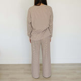 Back view of a woman wearing the Striped Loungewear Set | Women's, showcasing a cozy and stylish outfit.