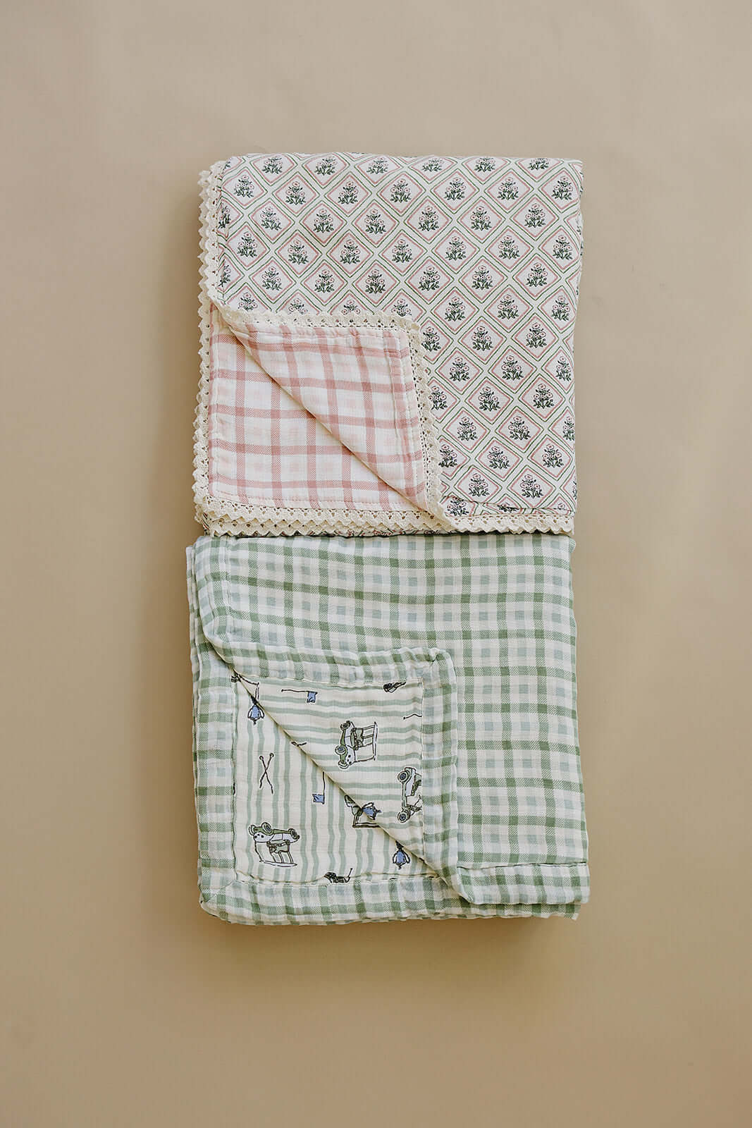 Tee Time + Green Gingham Muslin Quilt | Indulge your little one in the cozy comfort of our Muslin Quilt. Crafted from the same fabric as our beloved muslin swaddles, this four-layer quilt offers warmth and softness for a restful sleep. Our neutral colors