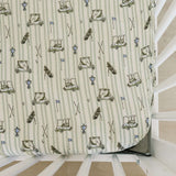 Tee Time Muslin Crib Sheet | Transform your baby's crib into a cozy haven with our Tee Time Muslin Crib Sheet. Crafted from our exclusive soft and breathable muslin fabric, this sheet showcases a neutral design that adds a touch of warmth and style to the