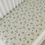 Tee Time Muslin Crib Sheet | Transform your baby's crib into a cozy haven with our Tee Time Muslin Crib Sheet. Crafted from our exclusive soft and breathable muslin fabric, this sheet showcases a neutral design that adds a touch of warmth and style to the