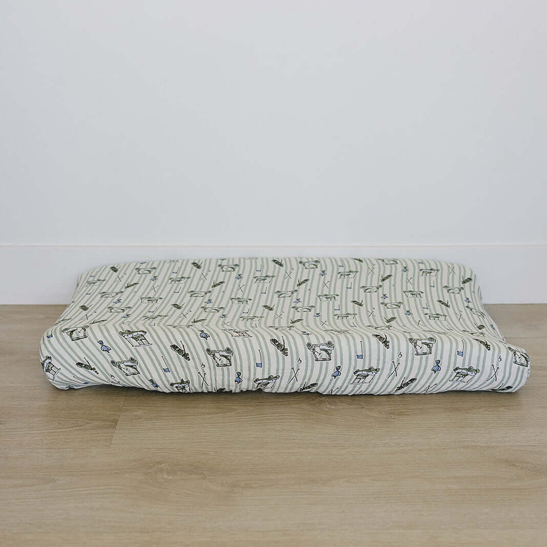 Tee Time Muslin Changing Pad Cover | Transform your baby's changing area with the Mebie Baby Tee Time Muslin Changing Pad Cover. Made from soft and breathable muslin fabric, this cover is gentle on your baby's skin. The fun design adds a touch of modern s