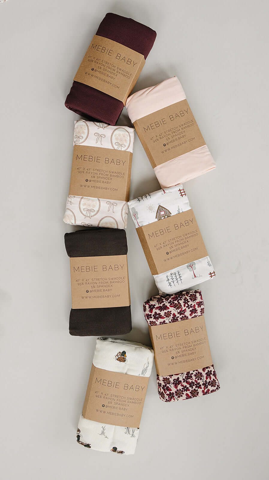 Deep Violet Ribbed Bamboo Stretch Swaddle collection by Mebie Baby featuring soft, stylish designs.