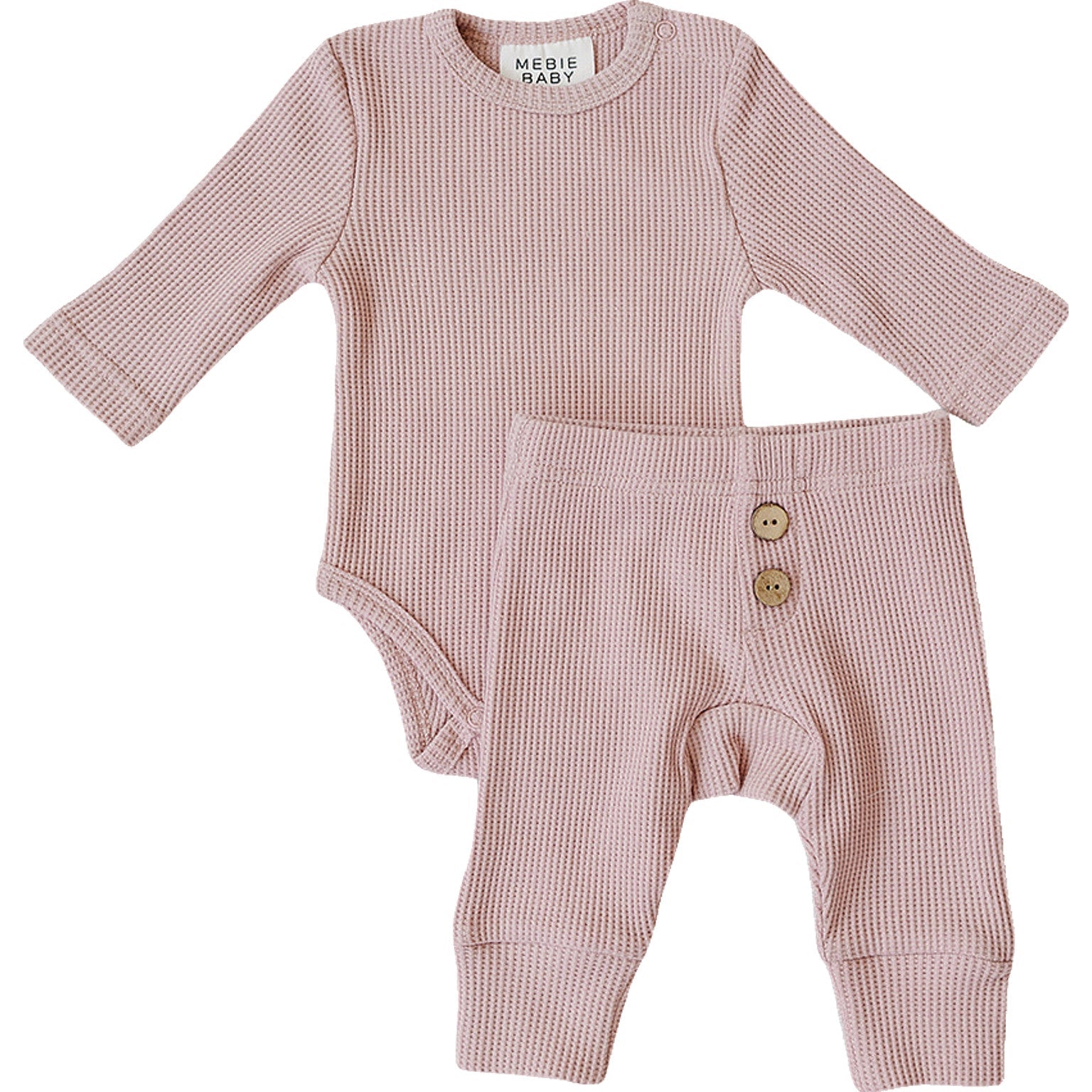 Pink Waffle Set | Milk & Baby | Comfy, cozy, and cute — our Pink Waffle Set is an everyday essential. Made from soft waffle-knit fabric, this matching set includes a long sleeve bodysuit and relaxed-fit pants for a cozy, all-day feel. Snaps at the bottom