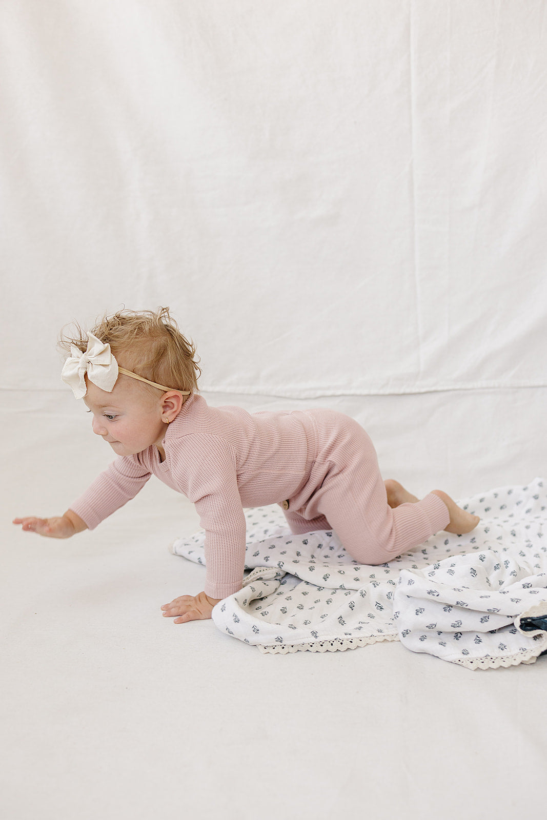 Pink Waffle Set | Milk & Baby | Comfy, cozy, and cute — our Pink Waffle Set is an everyday essential. Made from soft waffle-knit fabric, this matching set includes a long sleeve bodysuit and relaxed-fit pants for a cozy, all-day feel. Snaps at the bottom