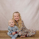Blue Checkered Bamboo Zipper | The Blue Checkered Bamboo Zipper pajamas are a must-have for your baby's wardrobe. Made from soft bamboo fabric, these gender-neutral footed pajamas feature a convenient double zipper design that allows for easy diaper chang